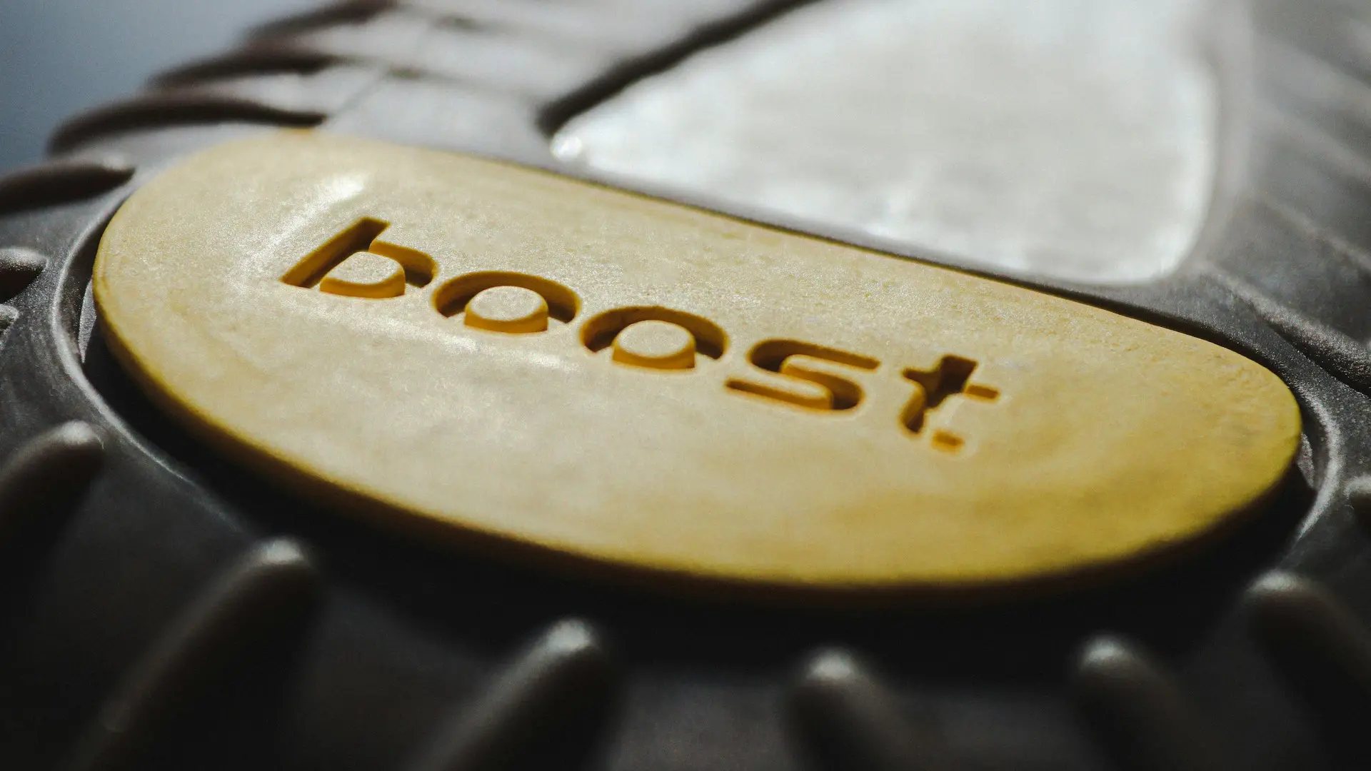 a close up of a shoe with the word boost on it